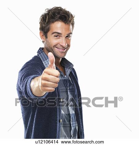 Studio shot of young with thumbs up View Large Photo Image Picture - Studio shot of young with thumbs up. Fotosearch