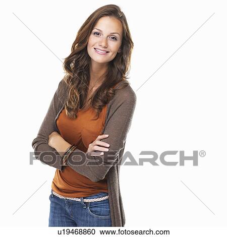 Studio shot of young woman smiling View Large Photo Image Stock Image - Studio shot of young woman smiling. Fotosearch