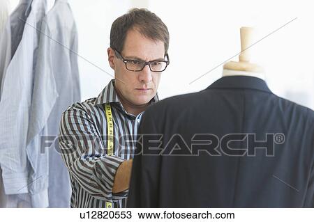 Tailor at work View Large Photo Image Stock Image - Tailor at work. Fotosearch