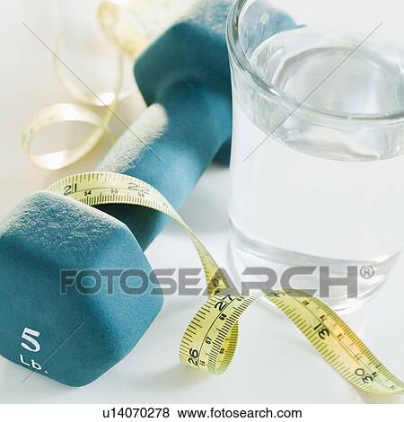 Tape measure, exercise weights and glass of water, studio shot View Large Photo Image Stock Photo - Tape measure, exercise weights and glass of water, studio shot. Fotosearch