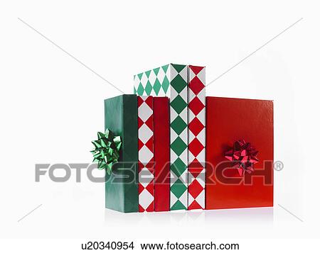Picture - Three boxes with ribbons, studio shot. Fotosearch