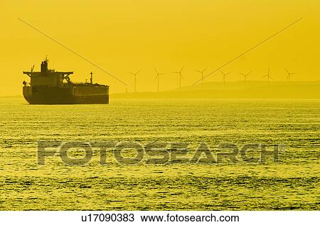 Turkey, Oil tanker on sea with wind turbines in background View Large Photo Image Stock Image - Turkey, Oil tanker on sea with wind turbines in background. Fotosearch