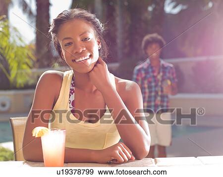 USA, Arizona, Scottsdale, Young couple at pool side bar View Large Photo Image Stock Photo - USA, Arizona, Scottsdale, Young couple at pool side bar. Fotosearch