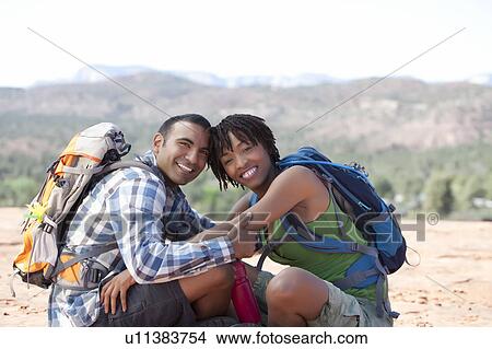 USA, Arizona, Sedona, Young couple hiking and enjoying desert scenery View Large Photo Image Picture - USA, Arizona, Sedona, Young couple hiking and enjoying desert scenery. Fotosearch