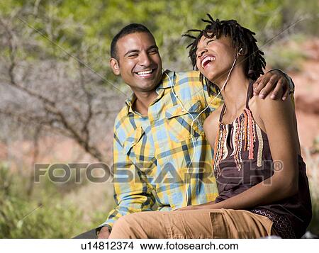 Picture - USA, Arizona, Sedona, Young couple hiking and enjoying desert scenery. Fotosearch