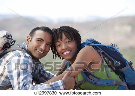 USA, Arizona, Sedona, Young couple hiking and enjoying desert scenery View Large Photo Image Stock Image - USA, Arizona, Sedona, Young couple hiking and enjoying desert scenery. Fotosearch