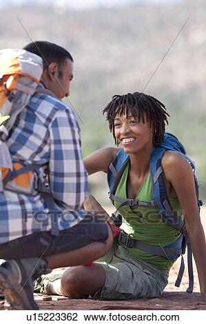 USA, Arizona, Sedona, Young couple hiking and enjoying desert scenery View Large Photo Image Stock Image - USA, Arizona, Sedona, Young couple hiking and enjoying desert scenery. Fotosearch