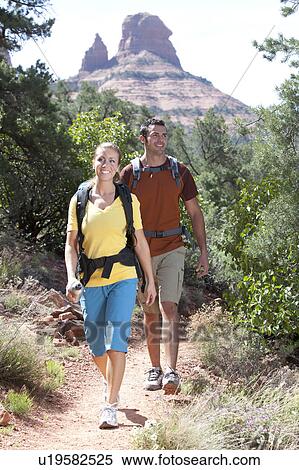 USA, Arizona, Sedona, Young couple hiking View Large Photo Image Stock Photography - USA, Arizona, Sedona, Young couple hiking. Fotosearch
