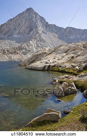 USA, California, Sequoia National Park, Five Lakes trail, Hiker sitting at edge of lake View Large Photo Image Stock Image - USA, California, Sequoia National Park, Five Lakes trail, Hiker sitting at edge of lake. Fotosearch
