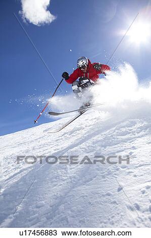 Stock Image - USA, Colorado, Telluride, Downhill skiing. Fotosearch