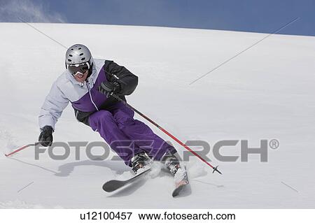 Stock Photo - USA, Colorado, Telluride, Downhill skiing. Fotosearch