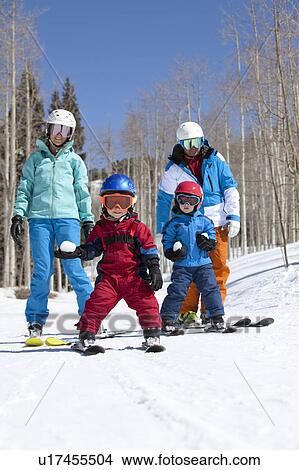 USA, Colorado, Telluride, Family skiing together View Large Photo Image Picture - USA, Colorado, Telluride, Family skiing together. Fotosearch