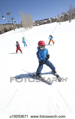 USA, Colorado, Telluride, Family skiing together View Large Photo Image Stock Image - USA, Colorado, Telluride, Family skiing together. Fotosearch