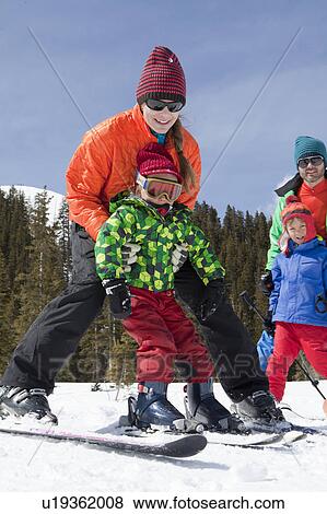 USA, Colorado, Telluride, Family skiing together View Large Photo Image Stock Photo - USA, Colorado, Telluride, Family skiing together. Fotosearch