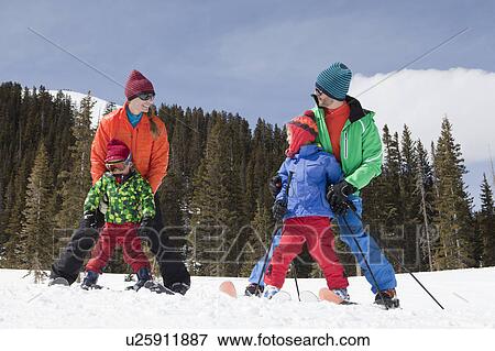 USA, Colorado, Telluride, Family skiing together View Large Photo Image Stock Photo - USA, Colorado, Telluride, Family skiing together. Fotosearch