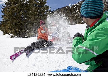 Stock Photography - USA, Colorado, Telluride, Family skiing together. Fotosearch