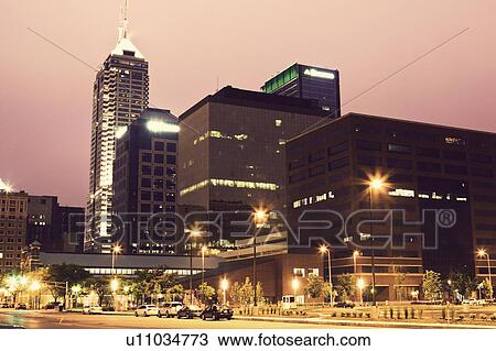 Stock Image - USA, Indiana, Indianapolis, Downtown at sunset. Fotosearch