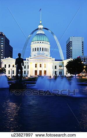 Stock Photo - USA, Missouri, St. Louis, Fountain and courthouse at dusk. Fotosearch