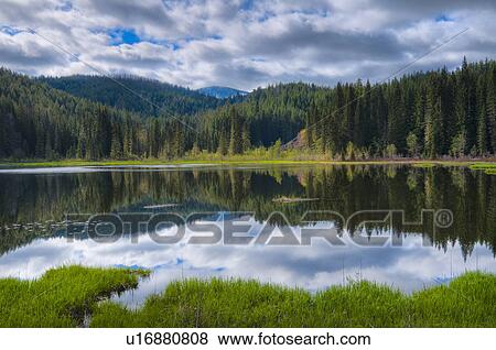 Stock Photo - USA, Mount Jefferson Wilderness, Scenic view of Lake Ann. Fotosearch