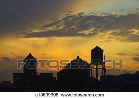 USA, New York, New York City, Skyline silhouette at sunset View Large Photo Image Stock Photo - USA, New York, New York City, Skyline silhouette at sunset. Fotosearch