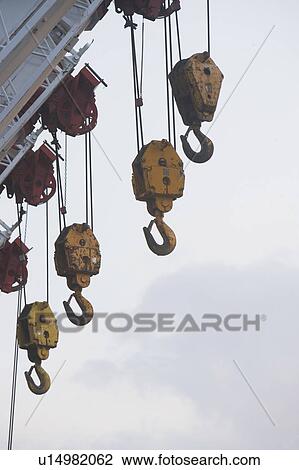 Stock Image - USA, New York State, New York City, Industrial equipment against sky. Fotosearch
