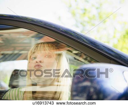 USA, New York, Williamsburg, Brooklyn, Portrait of woman in car View Large Photo Image Stock Image - USA, New York, Williamsburg, Brooklyn, Portrait of woman in car. Fotosearch