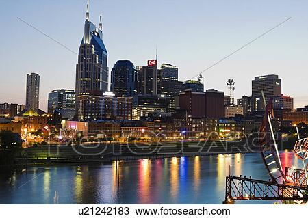 Stock Image - USA, Tennessee, Nashville, Evening skyline. Fotosearch