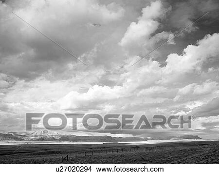 USA, Utah, Clouds over desert landscape View Large Photo Image Picture - USA, Utah, Clouds over desert landscape. Fotosearch