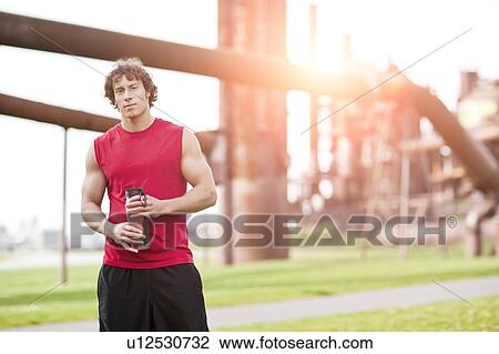 USA, Washington State, Seattle, Portrait of young athlete View Large Photo Image Stock Image - USA, Washington State, Seattle, Portrait of young athlete. Fotosearch