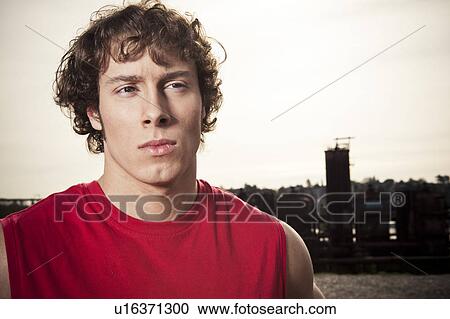 Stock Image - USA, Washington State, Seattle, Portrait of young athlete. Fotosearch
