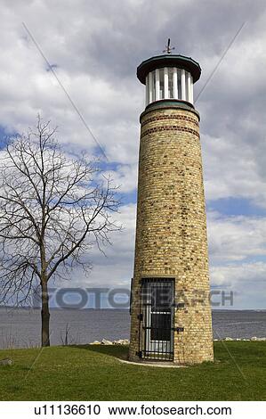 USA, Wisconsin, Oshkosh, Asylum Point Lighthouse by Lake Winnebago View Large Photo Image Stock Image - USA, Wisconsin, Oshkosh, Asylum Point Lighthouse by Lake Winnebago. Fotosearch