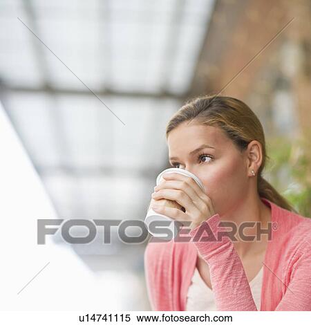 Woman drinking coffee View Large Photo Image Stock Photography - Woman drinking coffee. Fotosearch