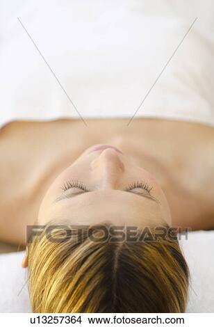 Woman relaxing at health spa View Large Photo Image Picture - Woman relaxing at health spa. Fotosearch
