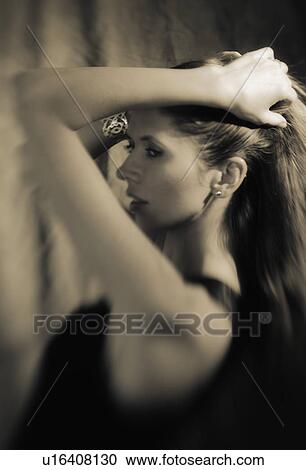 Woman with long hair View Large Photo Image Stock Image - Woman with long hair. Fotosearch
