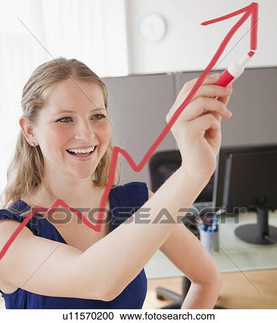 Young woman drawing increasing line with arrow View Large Photo Image Stock Image - Young woman drawing increasing line with arrow. Fotosearch