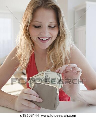 Young woman with purse View Large Photo Image Picture - Young woman with purse. Fotosearch