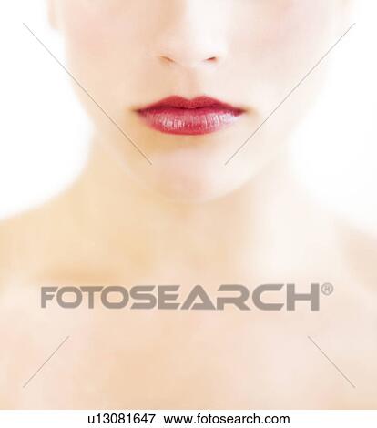 Young woman with red lips and pale complexion View Large Photo Image Stock Photo - Young woman with red lips and pale complexion. Fotosearch