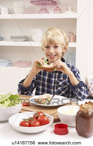 Boy Making Sandwich In Kitchen View Large Photo Image Stock Photograph - Boy Making Sandwich In Kitchen. Fotosearch
