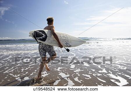 Boys surfing View Large Photo Image Picture - Boys surfing. Fotosearch