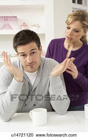 Couple Having Argument At Home View Large Photo Image Stock Image - Couple Having Argument At Home. Fotosearch