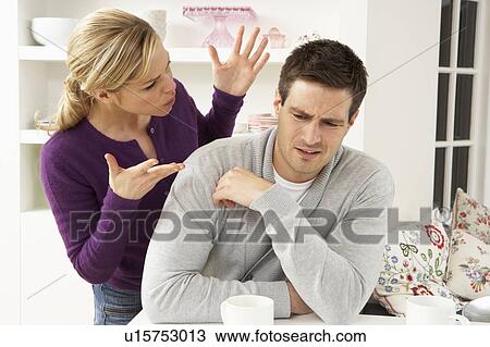 Stock Image - Couple Having Argument At Home. Fotosearch