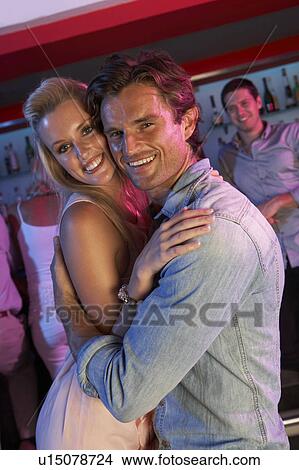 Couple Having Fun In Busy Bar View Large Photo Image Picture - Couple Having Fun In Busy Bar. Fotosearch
