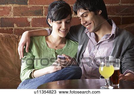Couple in love in Cafe View Large Photo Image Stock Image - Couple in love in Cafe. Fotosearch