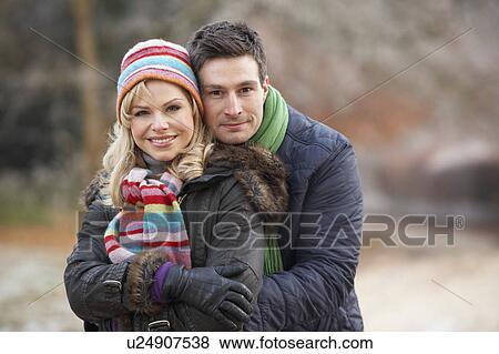 Couple On Winter Walk Through Frosty Landscape View Large Photo Image Stock Photo - Couple On Winter Walk Through Frosty Landscape. Fotosearch