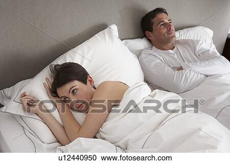Couple With Problems Having Disagreement In Bed View Large Photo Image Stock Image - Couple With Problems Having Disagreement In Bed. Fotosearch