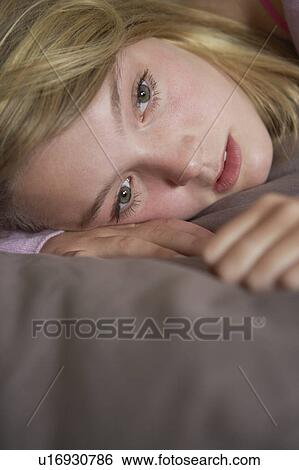 Depressed Teenage Girl Lying In Bedroom View Large Photo Image Stock Photograph - Depressed Teenage Girl Lying In Bedroom. Fotosearch