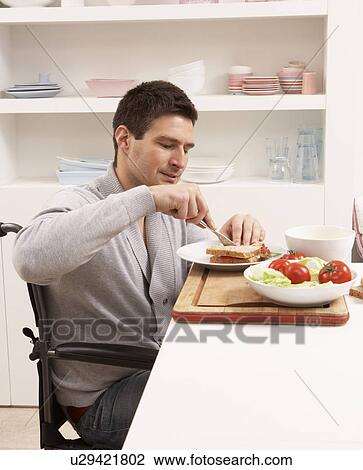 Disabled Man Making Sandwich In Kitchen View Large Photo Image Stock Image - Disabled Man Making Sandwich In Kitchen. Fotosearch