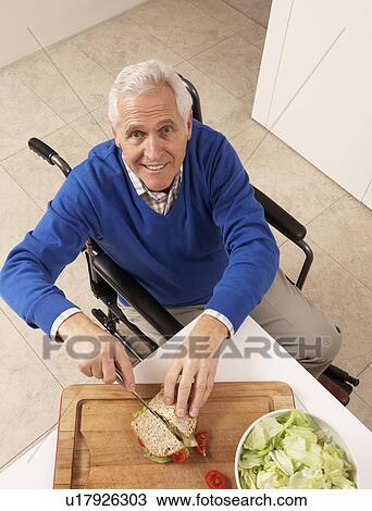 Disabled Senior Man Making Sandwich In Kitchen View Large Photo Image Stock Image - Disabled Senior Man Making Sandwich In Kitchen. Fotosearch