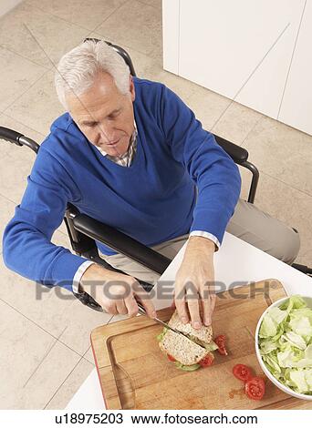 Disabled Senior Man Making Sandwich In Kitchen View Large Photo Image Stock Image - Disabled Senior Man Making Sandwich In Kitchen. Fotosearch