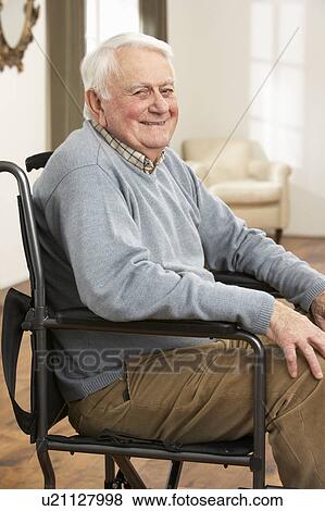 Disabled Senior Man Sitting In Wheelchair View Large Photo Image Stock Photo - Disabled Senior Man Sitting In Wheelchair. Fotosearch